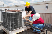 workers Industrial Air Conditioning Repair